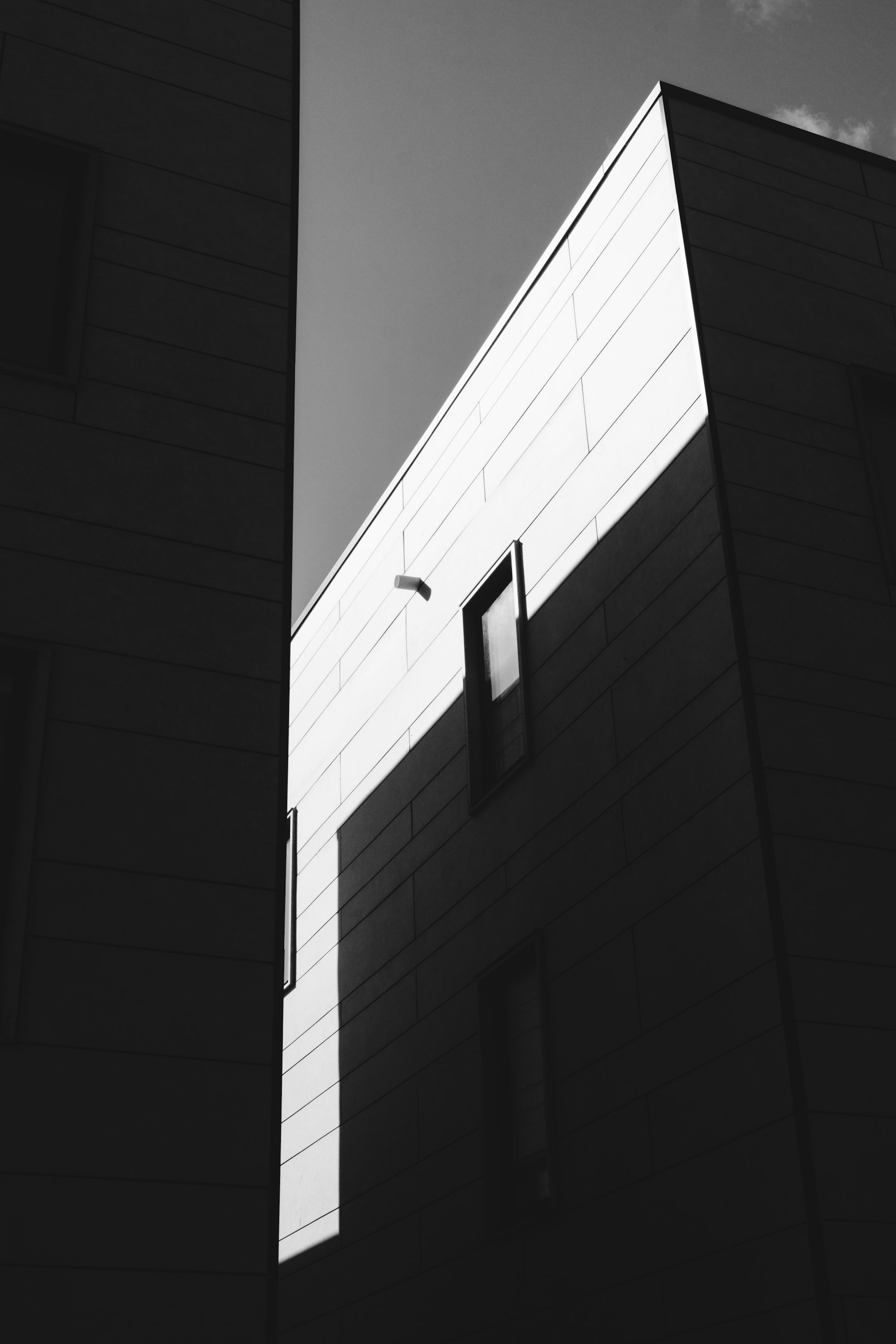 grayscale photo of concrete building