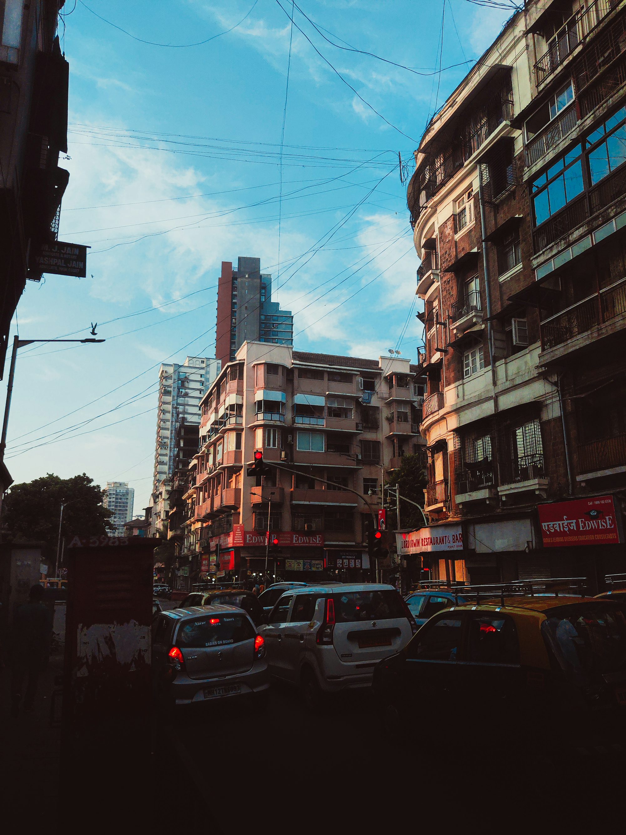 a city street filled with lots of tall buildings