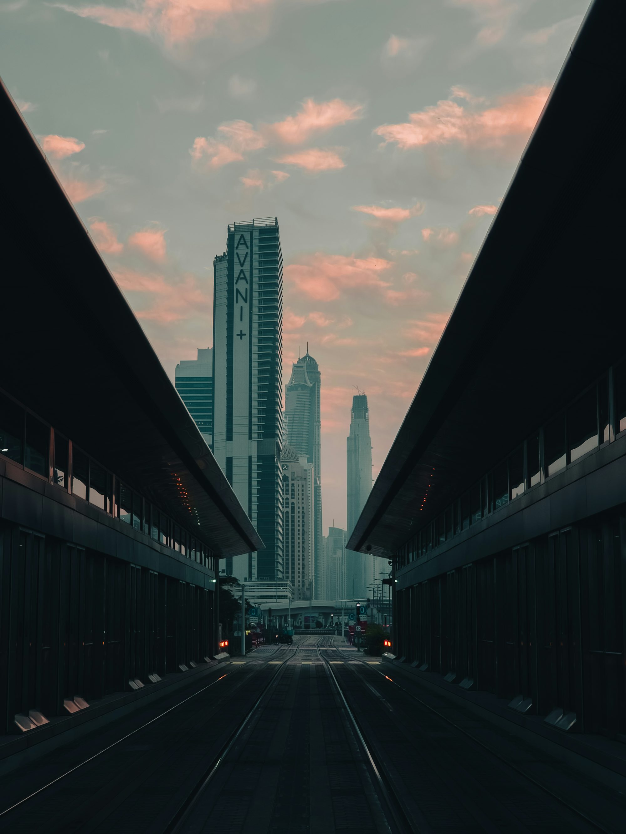 a view of a city from a train station