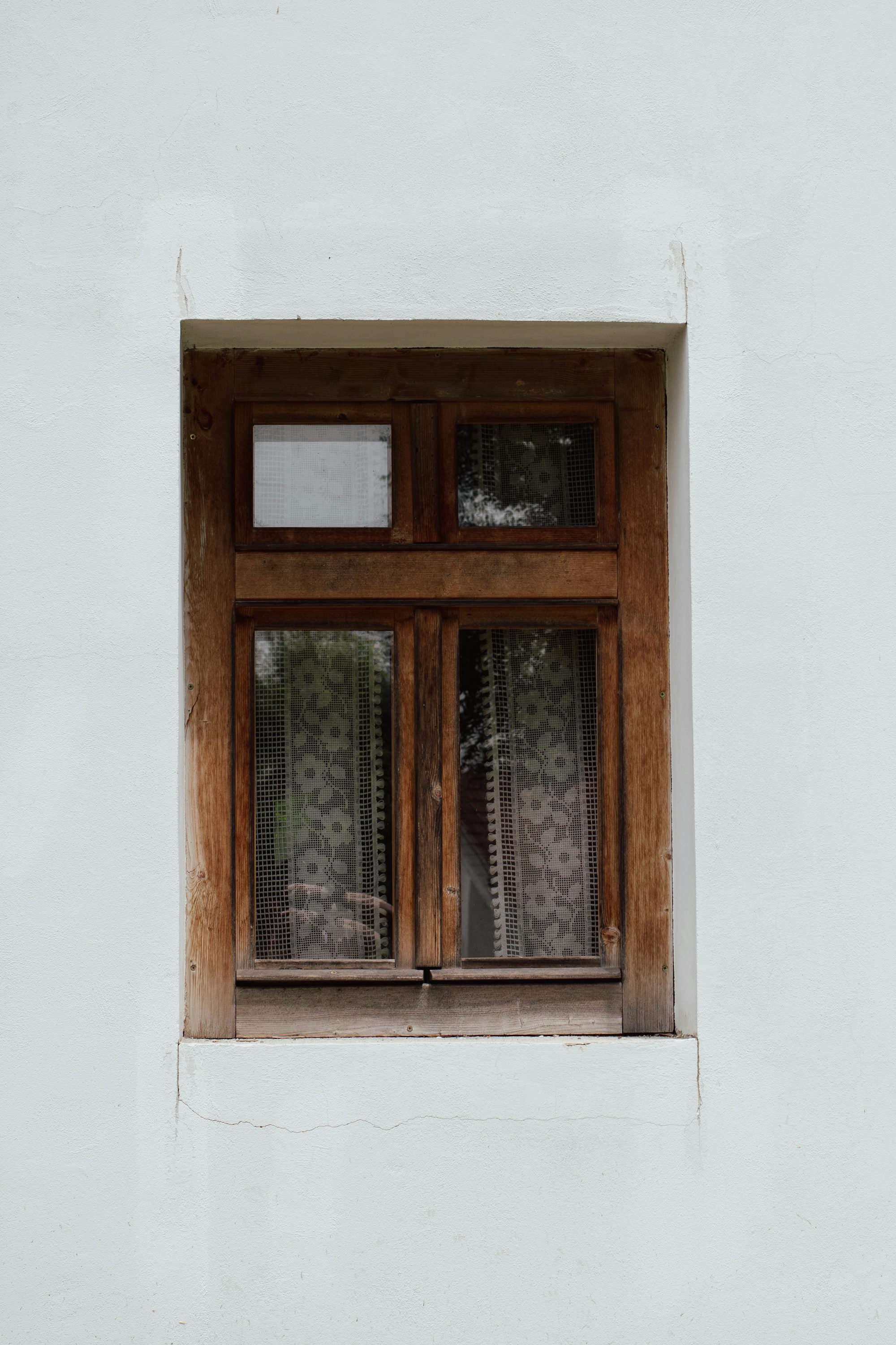 a window that has a curtain on it