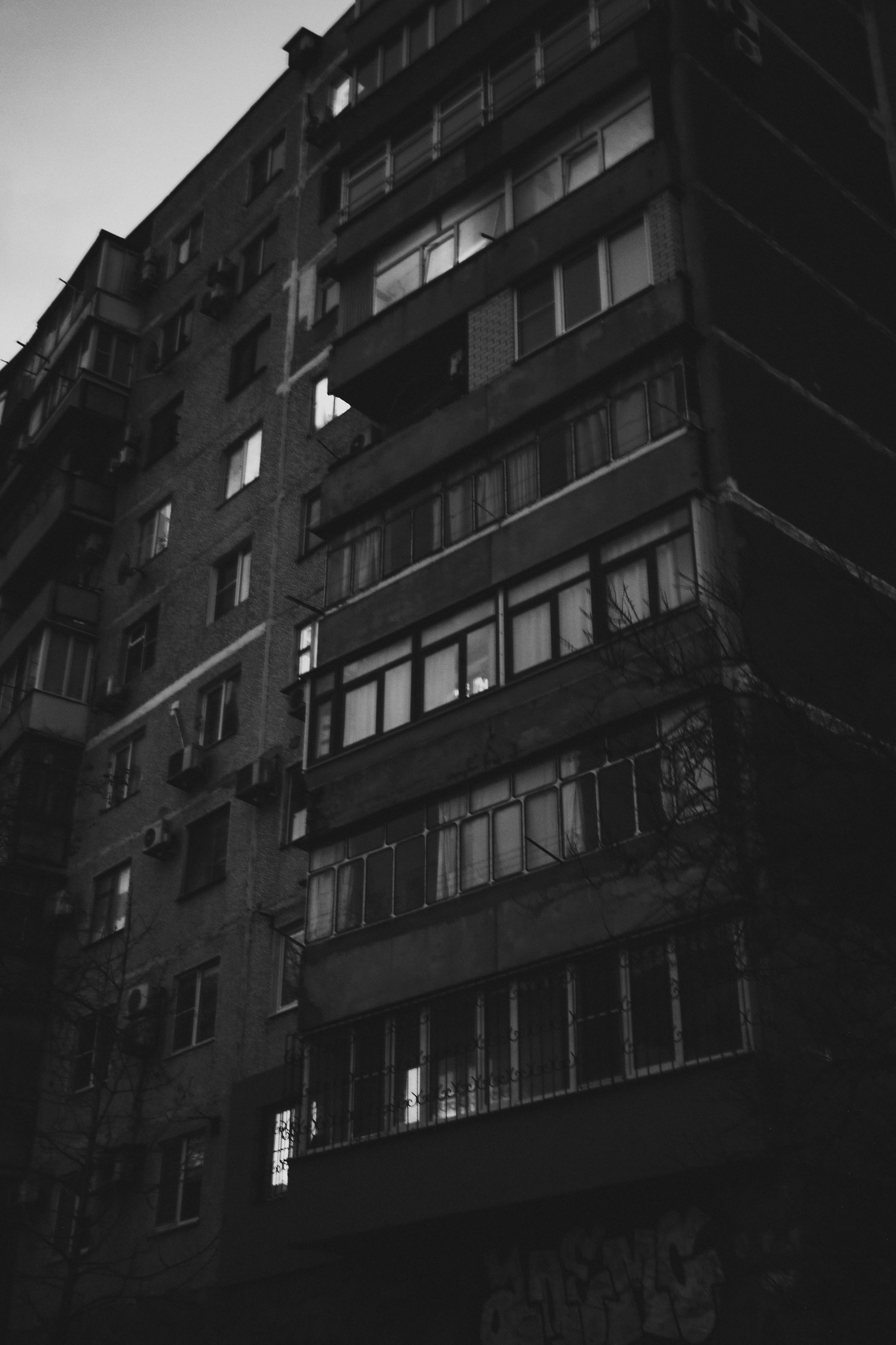 A black and white photo of a tall building